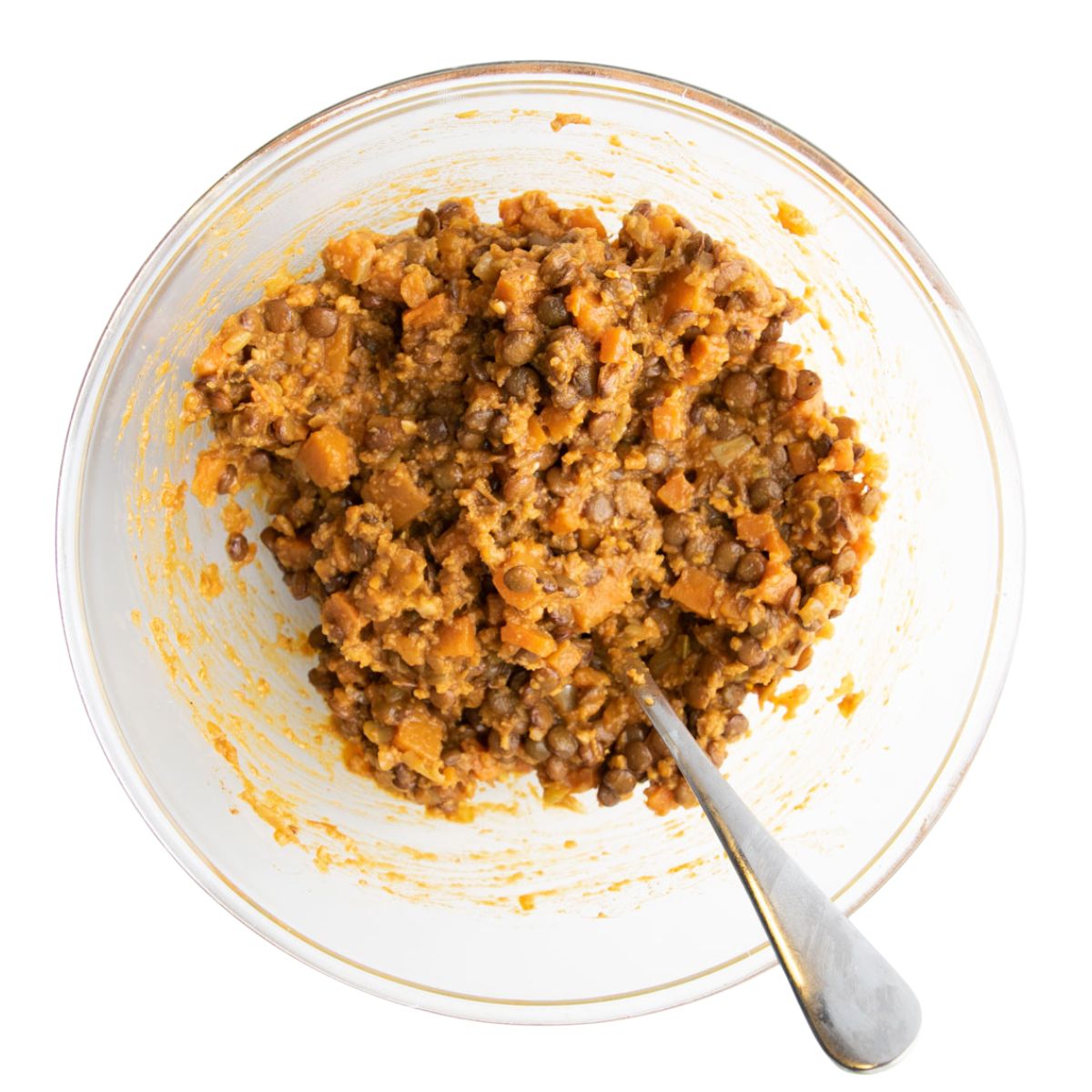 Cooked Lentils and Veggies Mixed with Egg and Breadcrumbs in Bowl. 
