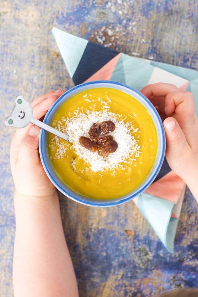 curried lentil and coconut soup. A deliciously spiced soup with sweet toppings to complement the spices. A fun and delicious soup for kids.