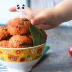 Child Grabbing Quinoa Ball from Bowl